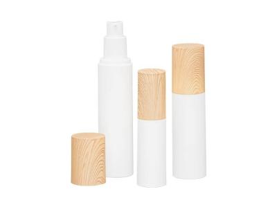 China Design of water transfer printing wood grain over cap PP Airless bottle 15ml 30ml 50ml for sale