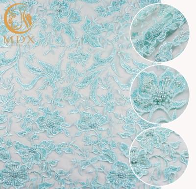 China Hand Embroidery Beaded Lace Fabric Fantastic Shine Finishing 135cm Width for sale
