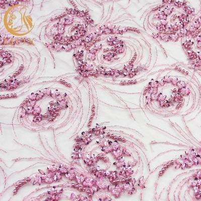 China Wedding Dress Pink Heavy Beaded Lace Fabric Customized 20% Polyester for sale