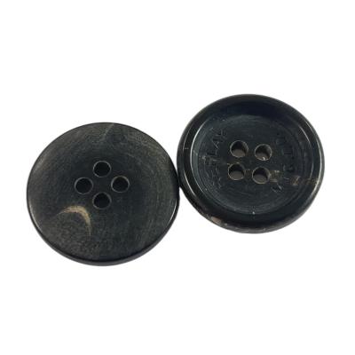 中国 衣服の30Lの付属の自然な実質の角製ボタン黒い色4の穴 販売のため