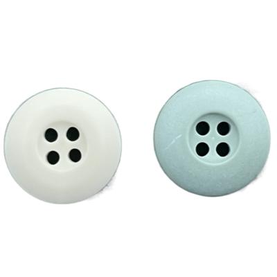 China Four Hole Internal Dye Chalk Plastic Resin Buttons Matt Finished Customized Color For Clothes for sale