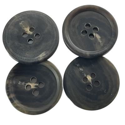 China Round Matte Finished Plastic Coat Faux Horn Buttons With Rim 36L Four Hole for sale
