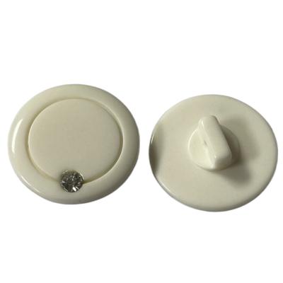 China Plastic Resin Decorative Shank Buttons Ring Design With Fake Diamond On Face 30L for sale