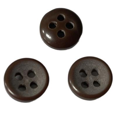 China Resin Fancy Plastic Buttons 4-Holes Dark Brown Color In 15L For Sewing Shirt for sale