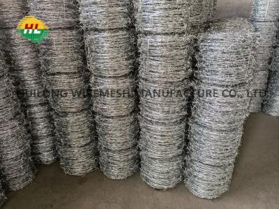 China 5inch Spacing Barbed Wire Roll Heavy Duty Galvanized 17 Gauge 4 point for sale