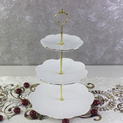 China Embossed European White Ceramic Three Layer String Plate Fruit Cake Rack for sale