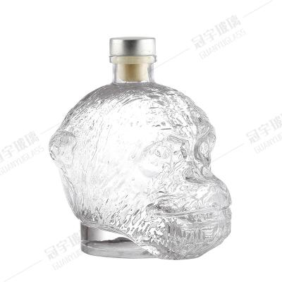 China 200ml Round Glass Bottle for Liquor Vodka Wine Whiskey Monkey Head Embellishment for sale