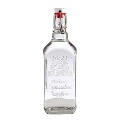 China Botella de vodka de vidrio de 750 ml con cilindro vacío de licor en venta