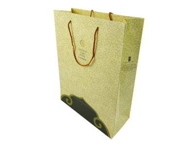 中国 OEM Printing Factory Yellow Color Custom Design Paper Bags Customized Logo Printed Cardboard Material Shopping Bag 販売のため