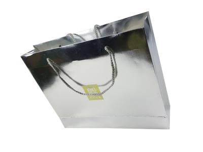 China Jinghui Printing Company Silver Color Shinny Craft Lamination Custom Design Paper Bags with Rigid Handle for sale