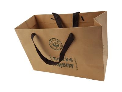 中国 Thick Brown Kraft Paper Material Custom Design Paper Bags OEM Logo Printing with Black Color Rope Handle 販売のため