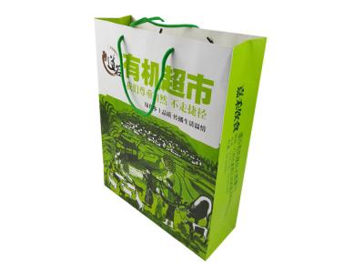 中国 Recycle Paper Material Green Color Printing Customized Size Custom Design Paper Bags with Green Color Handle 販売のため