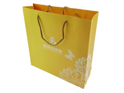 中国 Gold Color Paper Printing Customized Logo Embossing Rigid Cardboard Material Big Size Custom Design Paper Bags 販売のため