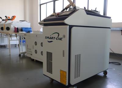 China Máquina de soldadura do laser da fibra do punho 1.5kw do aço carbono à venda