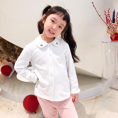 China Breathable White Blouse For Girls Tops Peter Pan Handmade Collar Shirts Wholesale Smocked Kids Clothes for sale