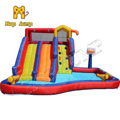 China Inflatable Castle Water Slide With Large Swimming Pool And Rock Climbing Wall for sale