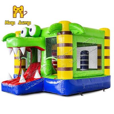 China Colorful Kids Inflatables Bouncers Castle House 4 Stitching Mini Bounce Crocodile Design for sale