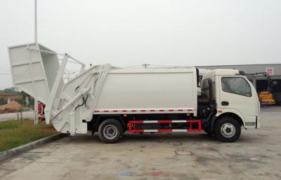 China RHD 4X2 Garbage Collection Truck , Commercial Trash Compactor Truck 6CBM for sale