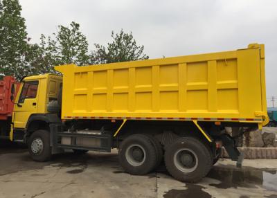 China Heavy HOWO Mine Dump Truck , Yellow Dump Truck 30 - 40 Tons 10-25CBM for sale