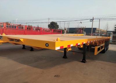 China Yellow Flatbed 3 Axles Container Semi Trailer Truck Carrying Heavy Equipment for sale