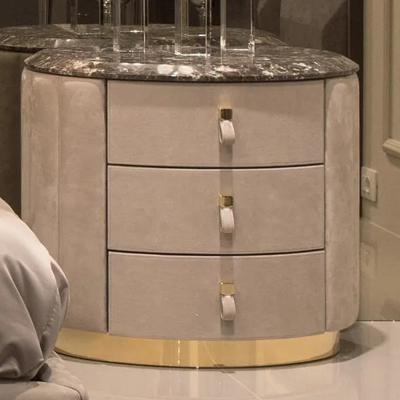 China Italian Minimalist Modern Bedside Tables Titanium 3 Drawer Modern Nightstand for sale