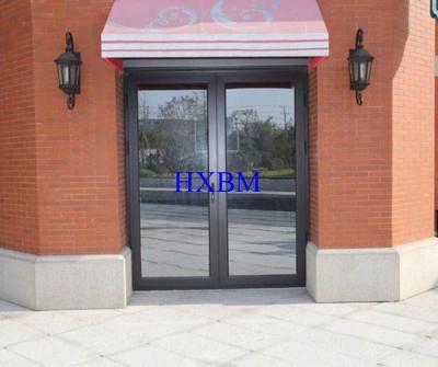 Chine Résistance à la corrosion d'excellentes portes en bois plaquées en aluminium d'isolation phonique à vendre