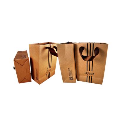 China Spot UV Paper Bag Printing , Kraft Paper Shopping Bag With Twisted Handle for sale