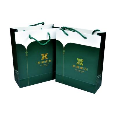 Chine Estampillage chaud olographe d'aluminium de sacs en papier faits main de papier d'art de C1S à vendre