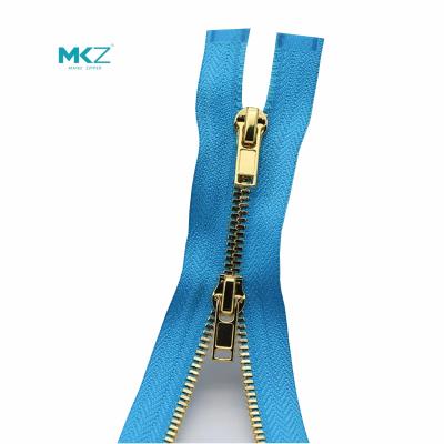 China Zipper With Thickened Bidirectional Teeth and Double Open Tail Gold Metal Zipper for sale