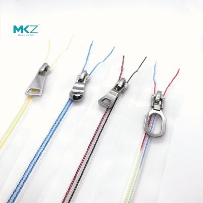 China Open End Transparent Colorful Teeth Nylon Coil Zipper for sale
