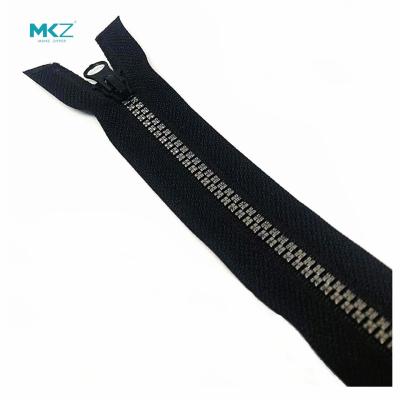 China Metallic Surface Plastic With Silver One Way Resin Zipper for sale