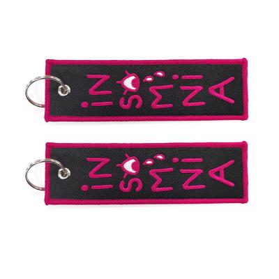 China Overlock Border Embroidered Key Chains Promotional Jet Tag Keychains for sale