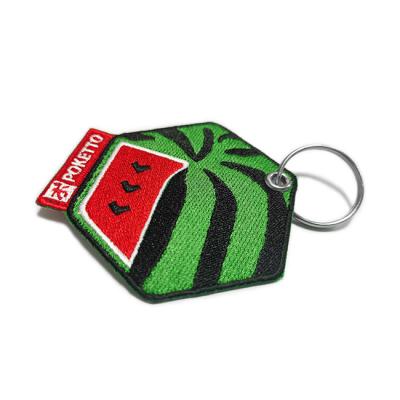 China Personalized Embroidered Keychains , Twill Background OEM Embroidery Key Fob for sale