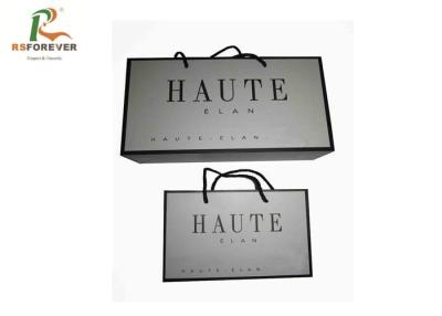 China Luxury Paper Shopping Custom Printed Bags For Clothing Packaging Rope Handle for sale