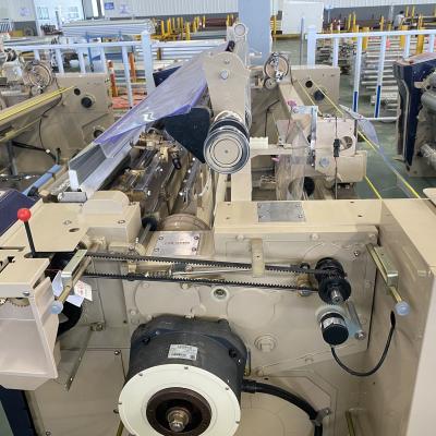 中国 190cmカム電子編む機械二重ノズルのWeft送り装置のウォーター ジェットの織機 販売のため