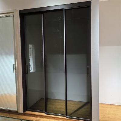 Chine Simple Three-track Three-linkage Kitchen Sliding Door Balcony Partition Door Double-layer Tempered Glass Door à vendre