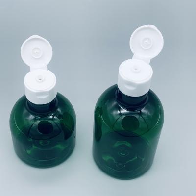China Dark Green Empty Wholesale 50ml 100ml 150ml Round Custom Shampoo Bottle PET Cosmetic Plastic Pump Bottle for sale