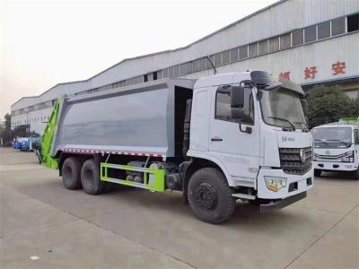 China Dongfeng 5995 Kg camión de basura compactador con chasis de acero al carbono en venta