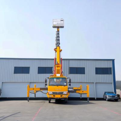 中国 25m Diesel Aerial Work Platform Truck 2 Axles with Front V and Rear V Outriggers Emergency Pump 販売のため