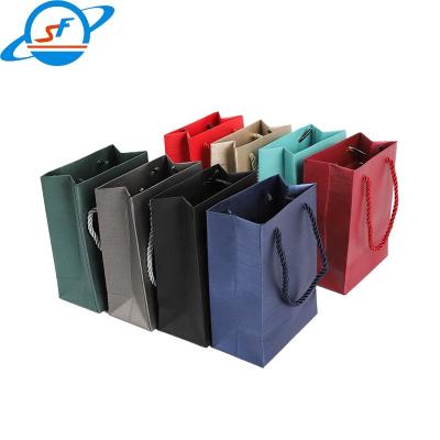 China New Custom Print Logo Gift High Quality Paper Bags Luxury Paper Shopping Bag With Ribbon Handle for sale