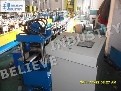 China Hydraulic Cutting Type Rolling Shutter Slats Roll Forming Machine With Punching Holes for sale