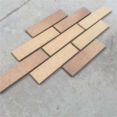 China Exterior Wall Decoration Clay Split Face Brick HM36413-7 With Rough Face for sale