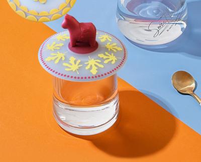 China Tampa criativa do copo do silicone dos desenhos animados, prova do escape e tampa de mantimento cerâmica dustproof do copo de chá, da tampa do copo da água, selada e a fresca à venda