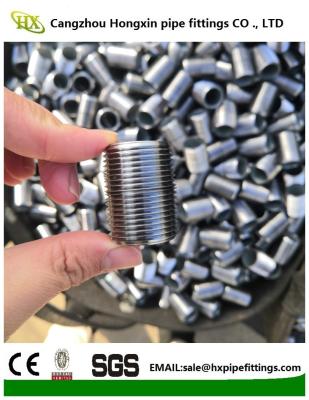China Npt long thread black & galvanized carbon steel pipe nipples en venta