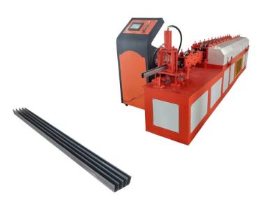 China Steel Side Guide Rail Roller Shutter Door Roll Forming Machine Size 5.6*1.2*1.5m for sale