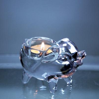 China Simple Design Eco-Friendly Glass Transparent Animal Shape Pig Candle Holder for Home Decoration à venda