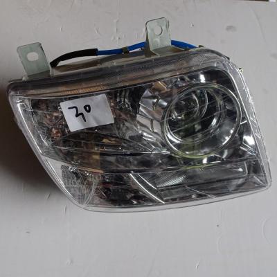 China HOWO truck spare parts WG9925720001 HOWO truck auto headlight for sale