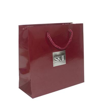 China Luxury Premium Middle Paper Gift Bags For Shopping Recycled Paper Bag for sale