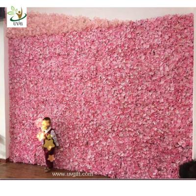 China UVG cheap wedding backdrop design plastic grid artificial flower wall and arch for wedding decor CHR1142 for sale