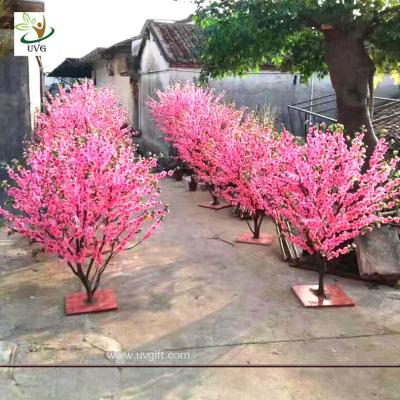 China UVG small artificial peach blossom wooden tree wedding reception decorations selling products CHR166 for sale